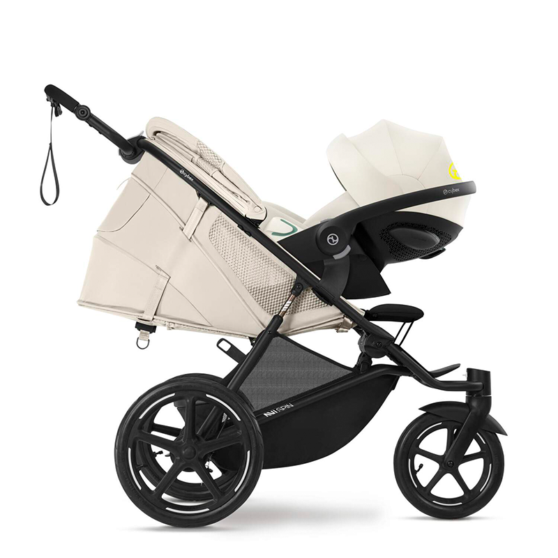 Cybex Avi Spin Dreirad-Kinderwagen in Seashell Beige mit Babyschale. 