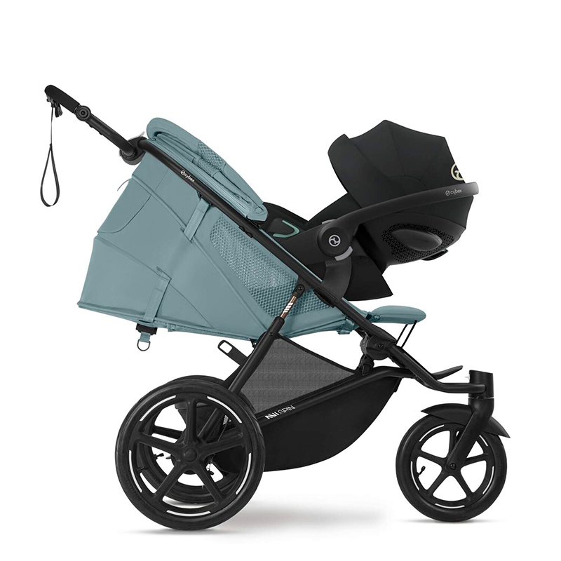 Cybex Avi Spin Dreirad-Kinderwagen in Blau mit Babyschale.