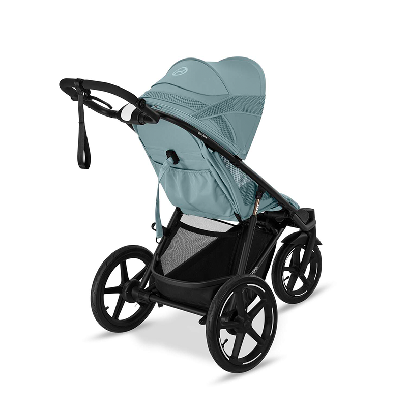 Cybex Avi Spin Dreirad-Kinderwagen in Blau von der Seite. 