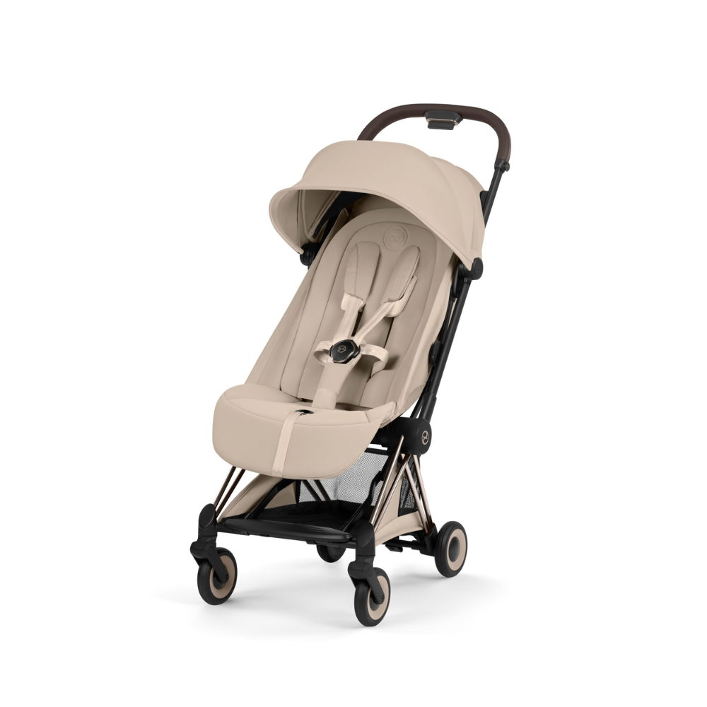Cybex Coya Buggy in Cozy Beige mit Gestell in Champagne Gold von der Seite. 