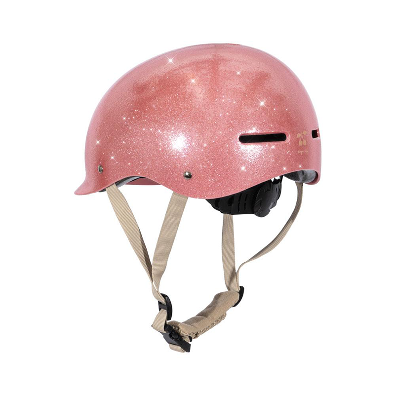 Pinker, glitzernder Fahrradhelm für Kinder von Konges Slojd. 