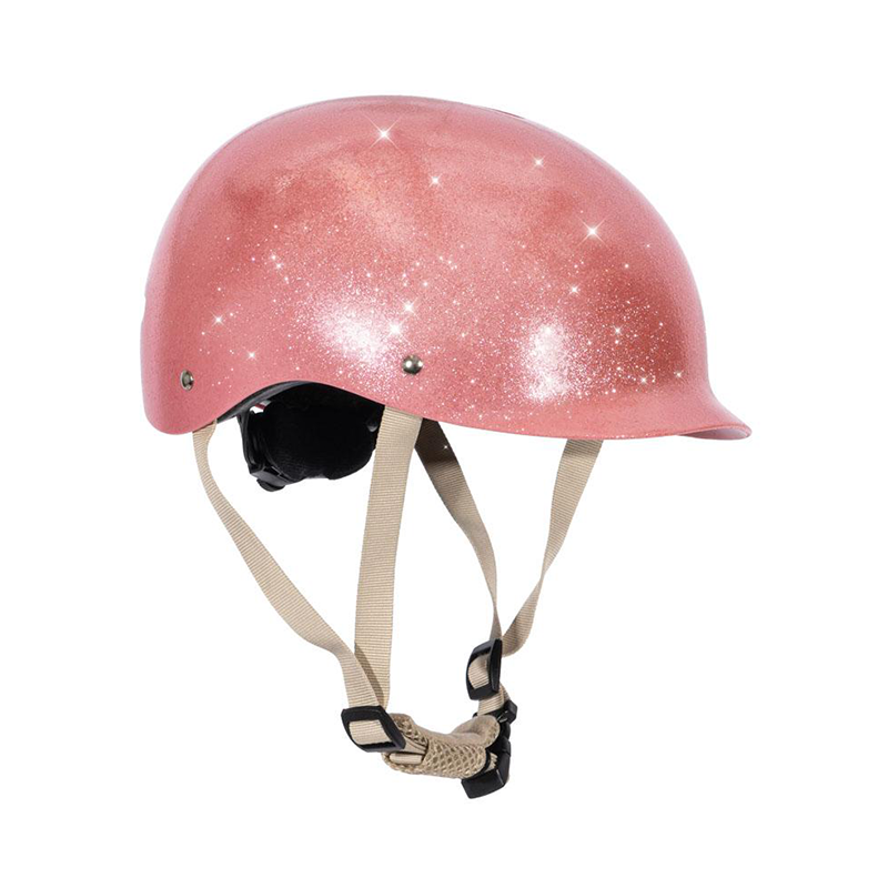 Pinker, glitzernder Fahrradhelm für Kinder von Konges Slojd. 