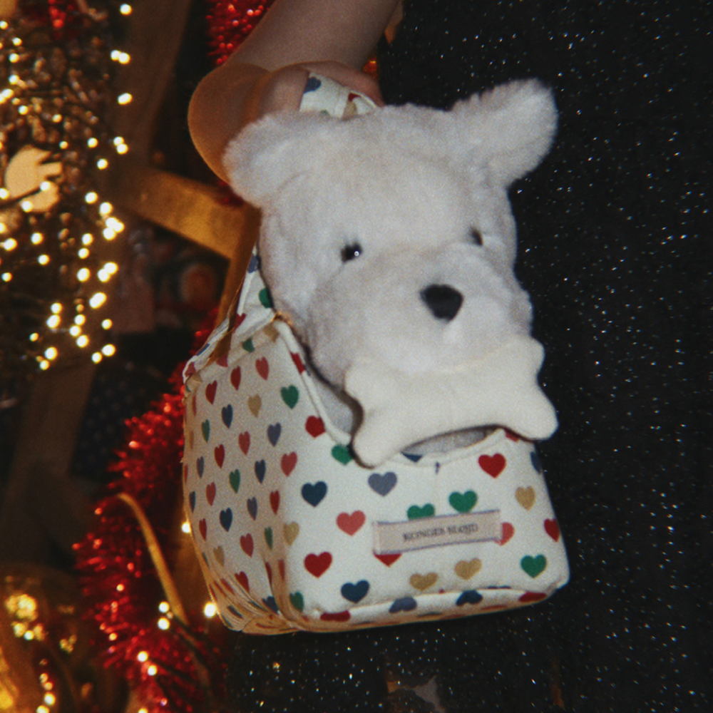 Konges Sløjd  Plüschtier Welpe mit Tasche 'Terry Puppy' Coeur Coloré