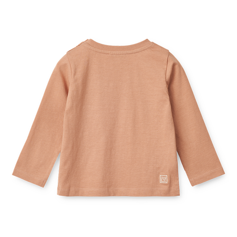 T-Shirt für Babys in Rosa mit Katzenprint auf dem Bauch von Liewood von hinten.