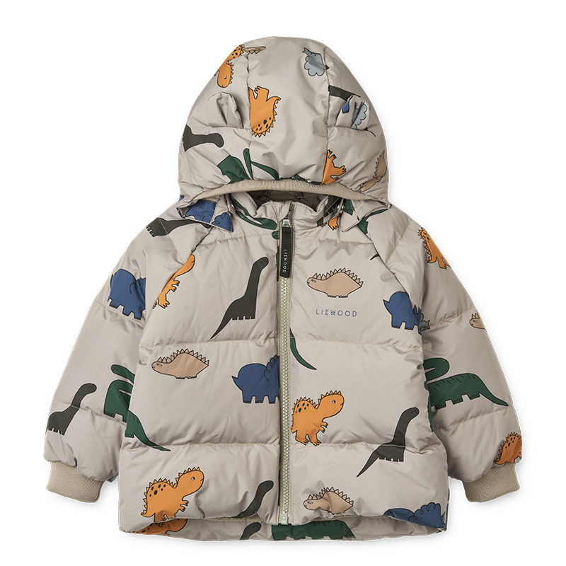 Kinder Daunenjacke in Beige mit buntem Dinosauriermuster von Liewood.