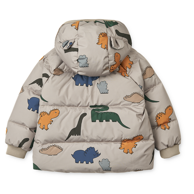 Kinder Daunenjacke in Beige mit Dinosauriermuster von Liewood von hinten.
