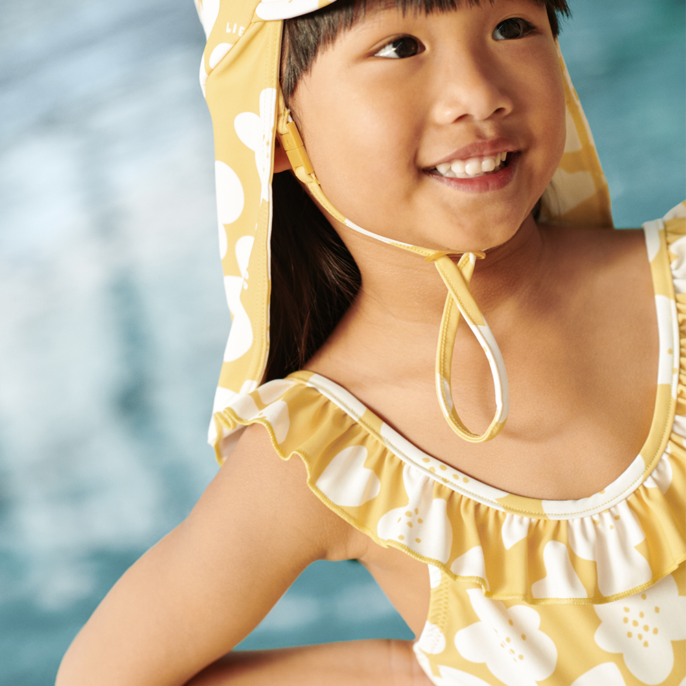 Liewood Maillot de bain UV « Kallie » Flower/Lemon Yellow