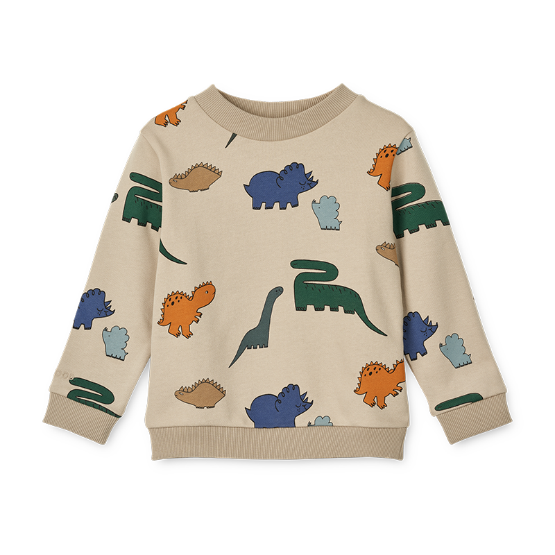 Pullover in Beige für Kinder mit buntem Dinosauriermuster von Liewood.
