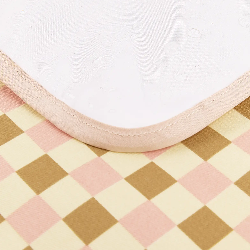 Nobodinoz Waterproof Changing Mat 'Hyde Park' Yellow Pink Mosaic
