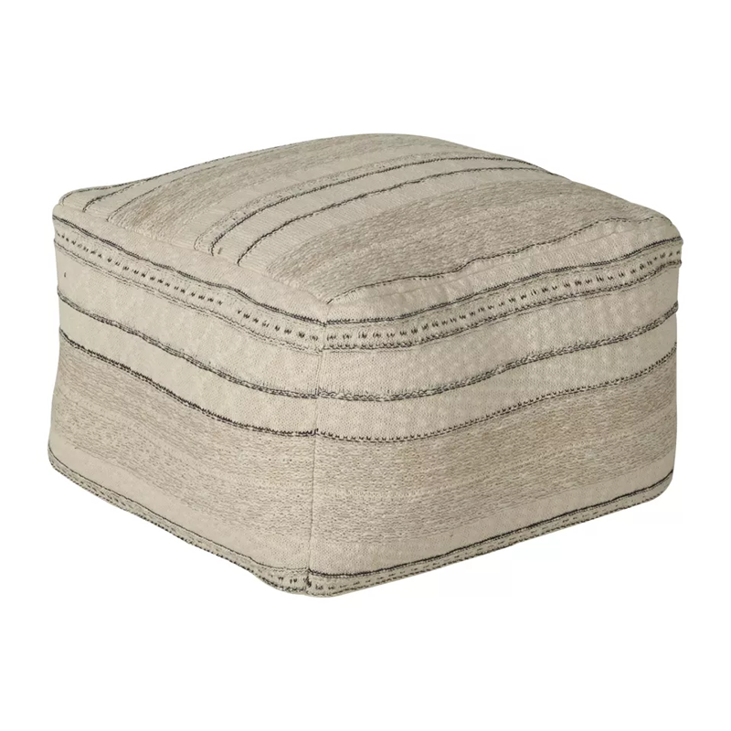 Pouf in Beige mit feinem schwarzen Strickmuster von Quax. 