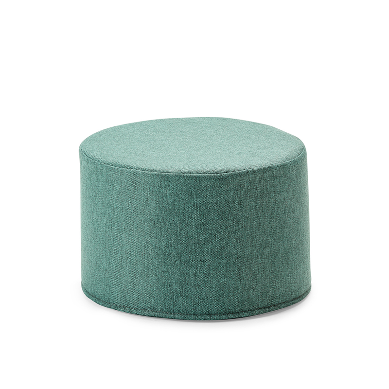 Wonderwuzz Hocker Peng Pouf Peng in der Farbe Paw Petrol der als Pouf oder Beistelltisch genutzt werden kann. 