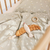 Dear April songbird mobile in baby cot.