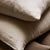 Cuscino in garza di cotone color sabbia di Tine K Home