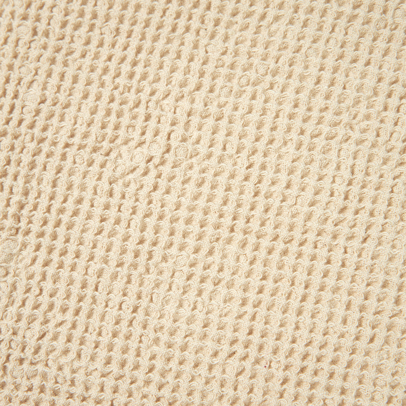 Wickelkissen und Bezug aus Bio-Baumwolle mit Wabenstruktur von Nobodinoz